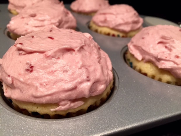 lemon cupcakes with raspberry frosting frosted